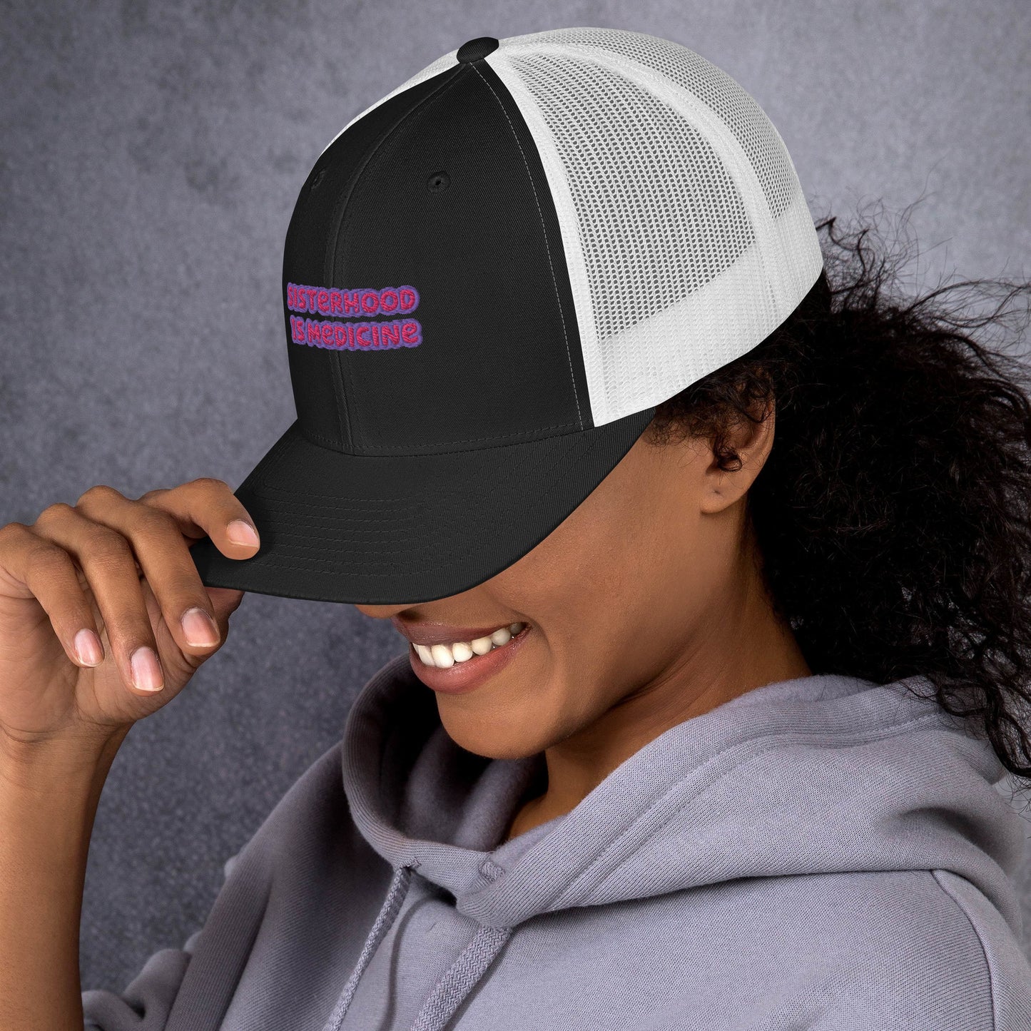 SISTERHOOD IS MEDICINE TRUCKER HAT